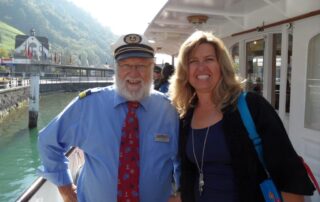 Sheila Cannon with the captain of the paddle steamer on the William Tell Express route.