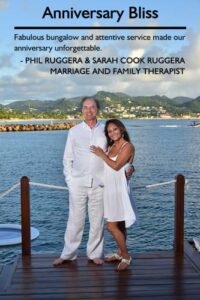 Couple enjoying their anniversary stay at Sandals Grande St. Lucian, reflecting their positive experience.