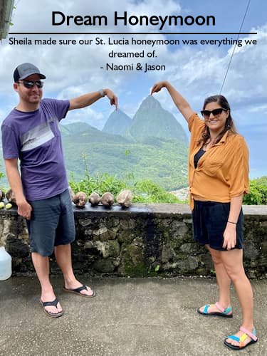 Couple at Sandals Grande in St. Lucia with the Pitons in the background during their honeymoon