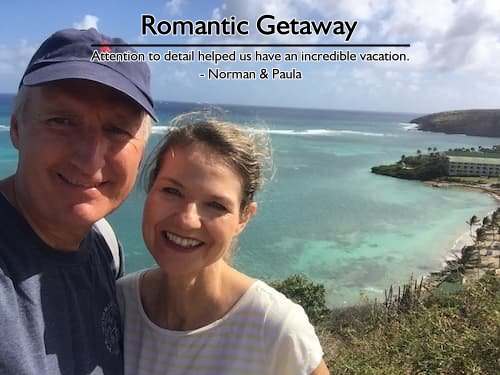 Couple celebrating their 30th wedding anniversary in the Caribbean, overlooking beautiful waters and their resort below, planned by Sheila Cannon