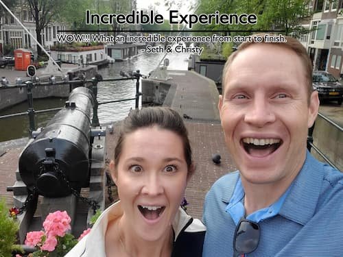 Couple in Amsterdam before their 15th wedding anniversary river cruise, planned by Sheila at Carefree Romantic Vacations