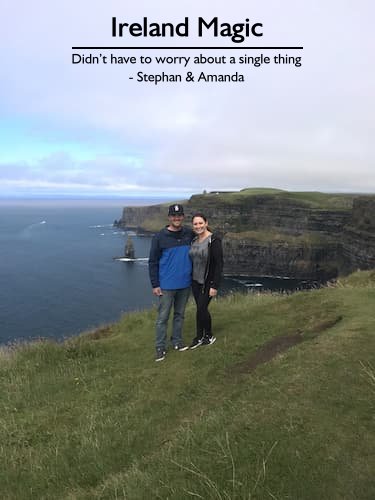 Couple celebrating their anniversary at the Cliffs of Moher during their trip to Ireland, planned by Sheila Cannon.