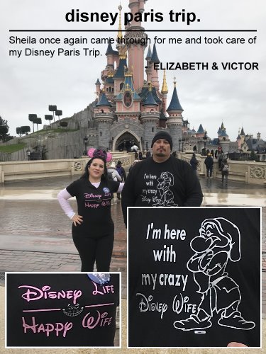 A couple at Disneyland Paris in front of the castle wearing custom Disney T-shirts during their 40th birthday trip planned by Sheila Cannon.