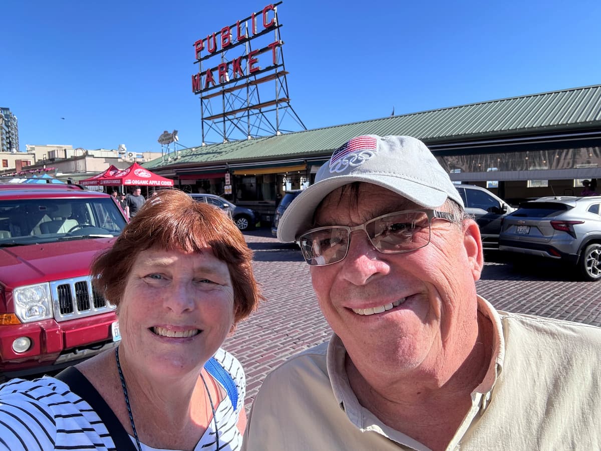 Doug and Lucia at Pike Place Market before their Alaska cruise from Seattle.