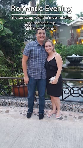 Couple dressed up for dinner standing by a beautiful pond at their lush resort during their perfect honeymoon, planned by Sheila at Carefree Romantic Vacations.