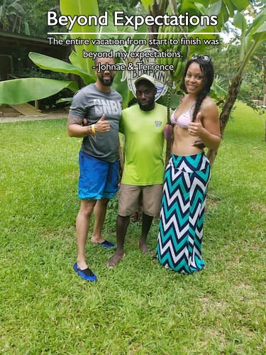 Couple posing with their guide at the River Bumpkin Farm during their all-inclusive honeymoon experience in Jamaica, planned by Sheila Cannon.