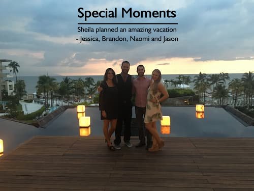 Two couples dressed up for dinner with the ocean and Secrets Vallarta Bay resort behind them, planned by an expert Secrets Vallarta Bay vacation planner.