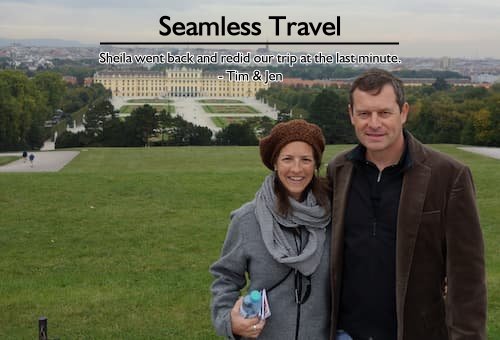 Tim & Jen overlooking Schonbrunn Palace in Vienna, part of their complex international trip planned by Sheila, including cities like Montreal and Salzburg.