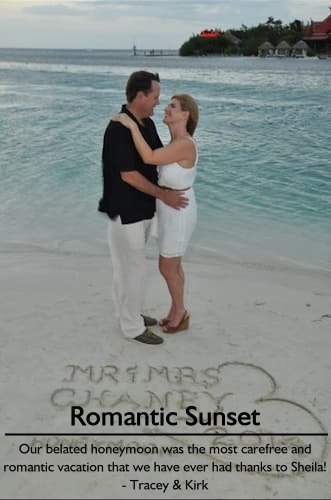 Tracey & Kirk enjoying their belated honeymoon at Sandals Royal Caribbean, Montego Bay, Jamaica, in a sunset embrace with their names written in the sand.